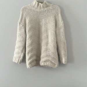 Really soft , cream knit sweater